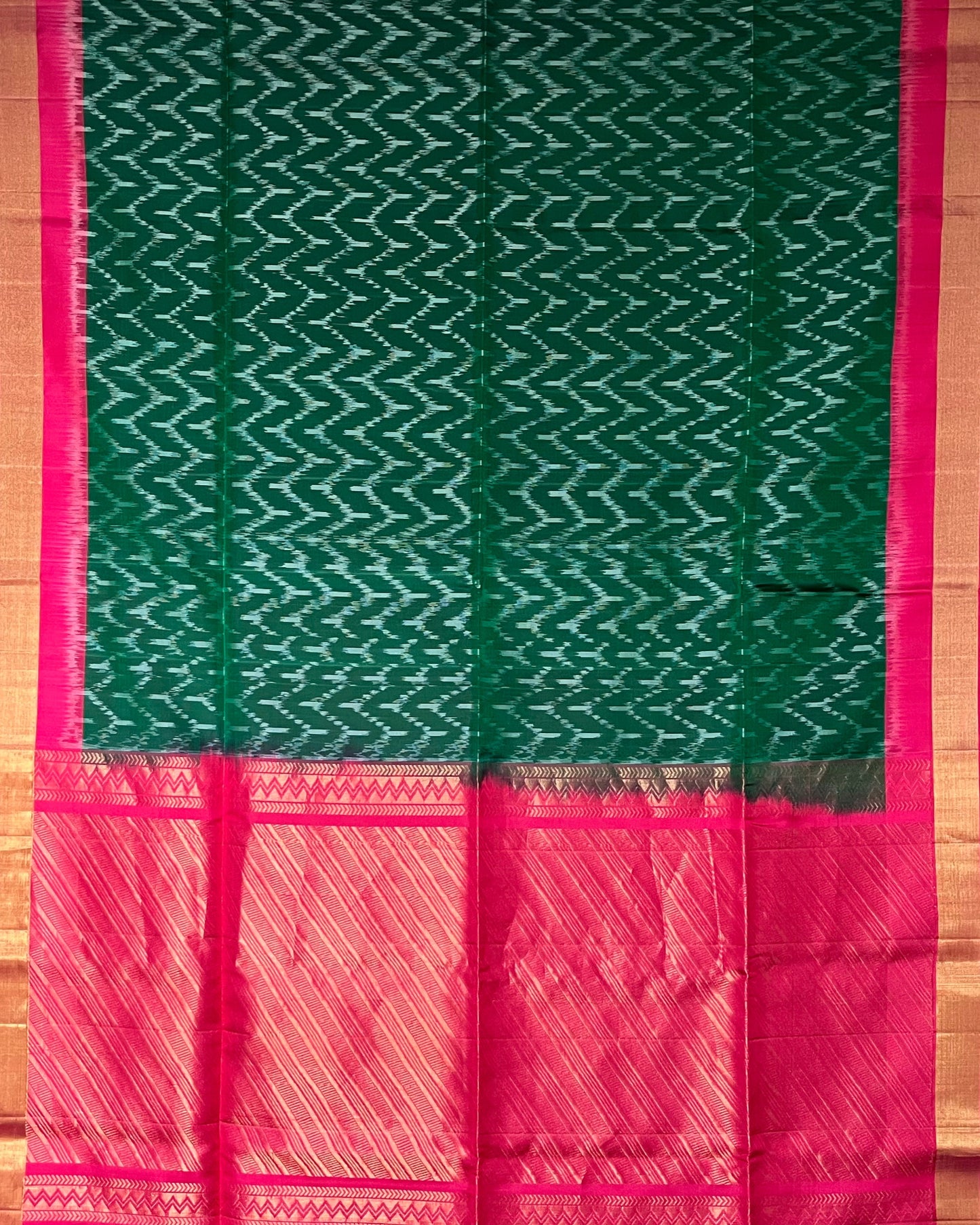 Emerald Pulse soft silk saree – full view with green ikat body and pink pallu