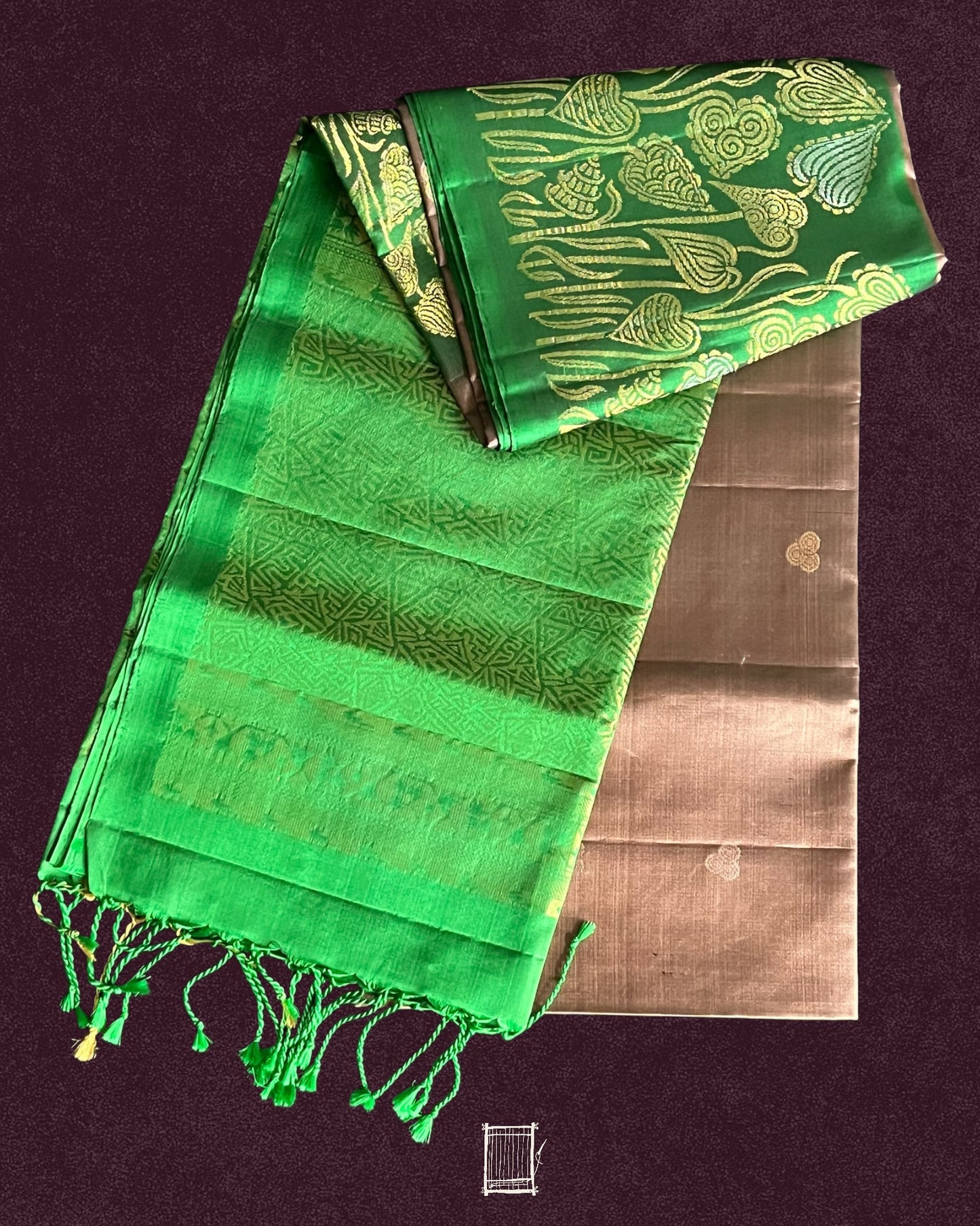 Beautiful cocoa brown body with green vine pallu