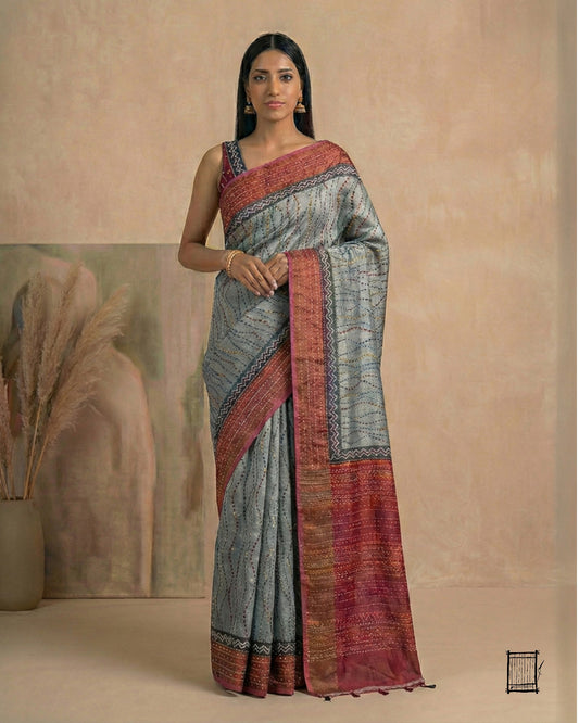 Grey body with bold Red pallu model style