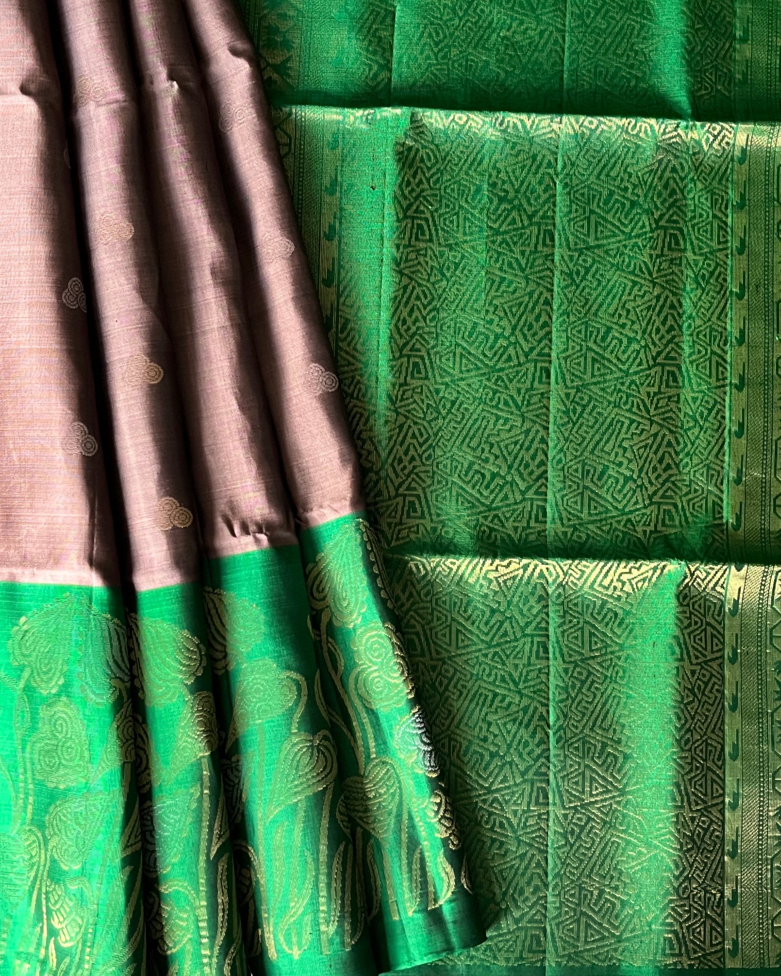 Gold vine border and moon buttis on chocolate pleats – Emerald green geometric pallu