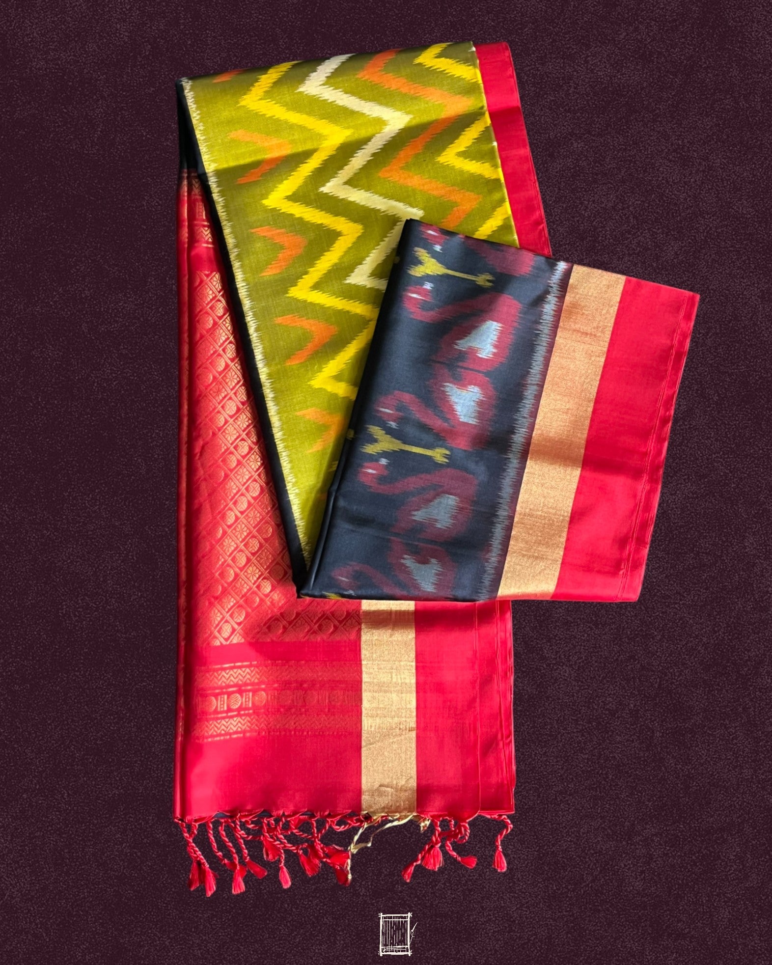 Top view of the mustard ikkat soft silk with red pallu and swan border